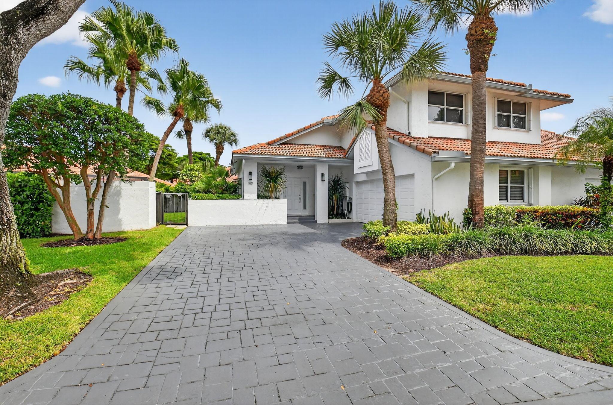 Welcome to this beautifully renovated 3-bedroom, 2.5-bath home in the highly sought-after Village of Cedar Cay within the prestigious Broken Sound Country Club. With 1,949 sq. ft. of living space, this light and bright residence offers modern finishes and an open layout perfect for both relaxing and entertaining. The first floor features smooth walls and sleek porcelain tile flooring throughout. The updated kitchen is designed for today's lifestyle, complete with white cabinetry, stainless steel appliances, and ample counter space. All three bedrooms are located upstairs, including the spacious primary suite with a walk-in closet and a luxurious en suite bath showcasing a quartz double vanity and a frameless glass shower. Enjoy South Florida living at its best with your own private pool