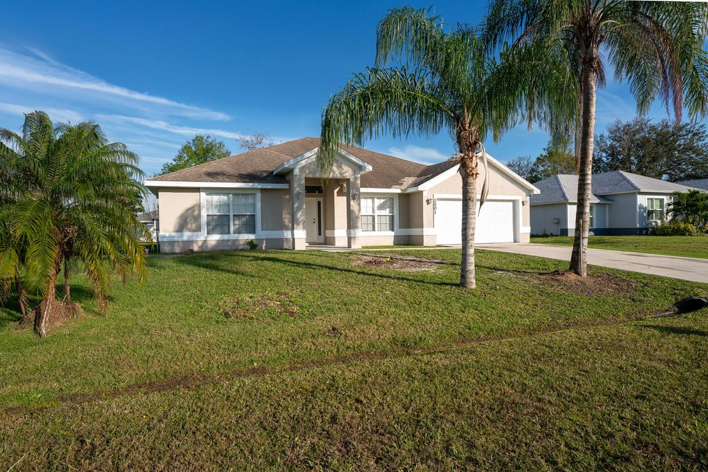 Photo of 2001 SW Ember Street, Port Saint Lucie, FL 34953 (MLS # R10955650)