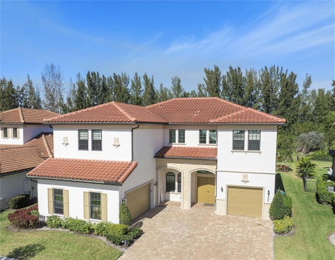 Photo of 9245 W Parkland Bay Trail, Parkland, FL 33076 (MLS # B26036306)