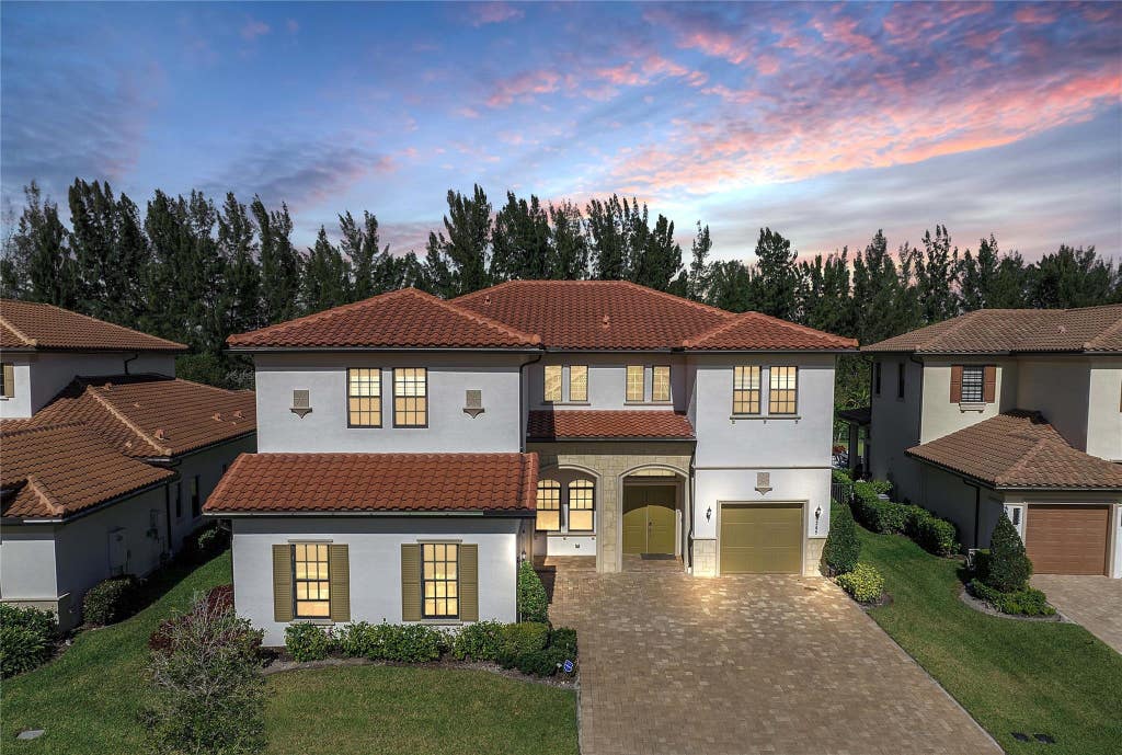 Photo of 9245 W Parkland Bay Trail, Parkland, FL 33076 (MLS # B26036306)