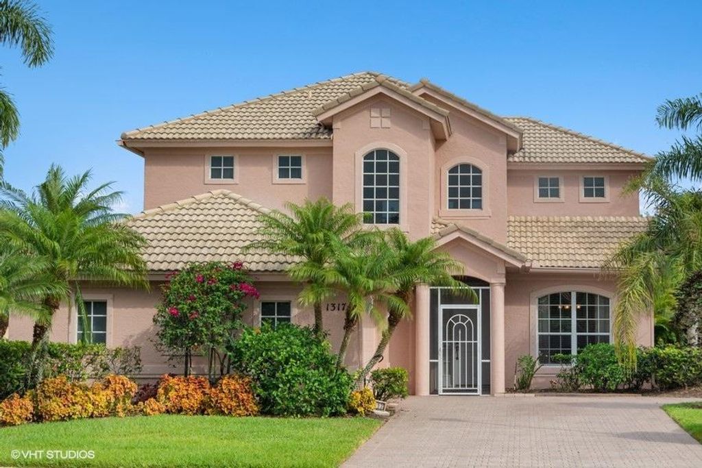 Photo of 1317 NW Mossy Oak Way, Jensen Beach, FL 34957 (MLS # R10715763)