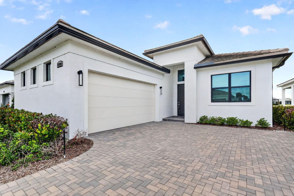 Photo of 11344 SW Pietra Way, Port Saint Lucie, FL 34987 (MLS # B26032358)
