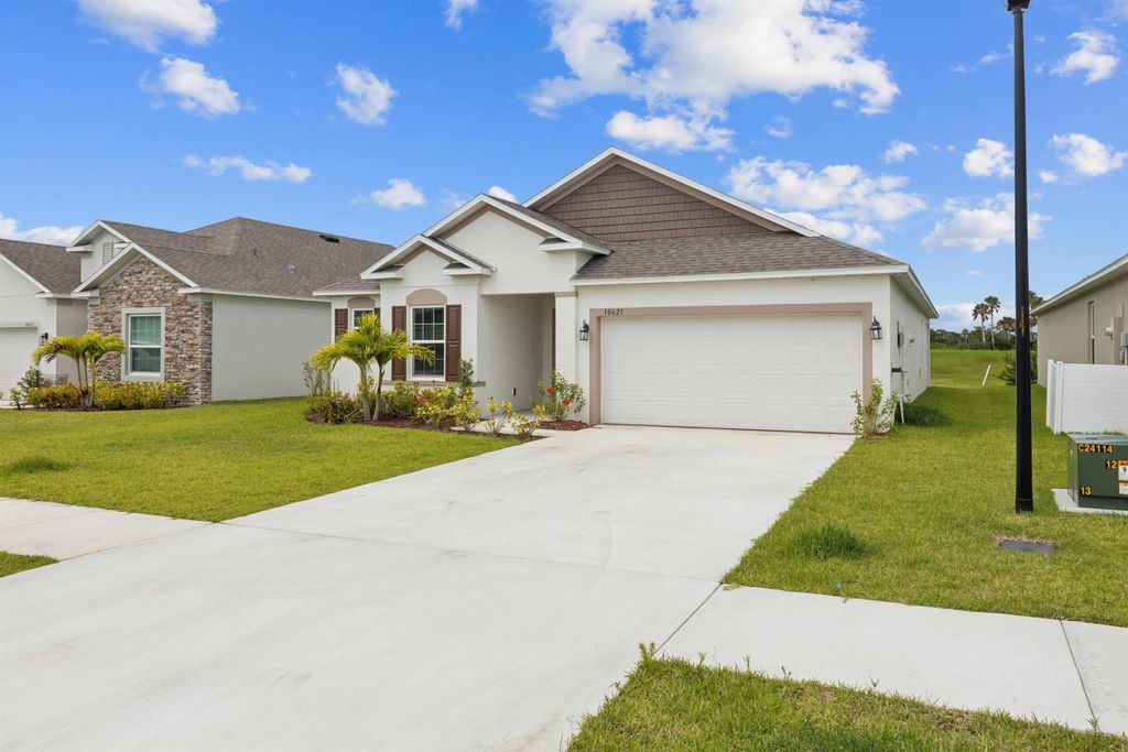 Photo of 10621 SW Vasari Way, Port St Lucie, FL 34987 (MLS # R10995668)