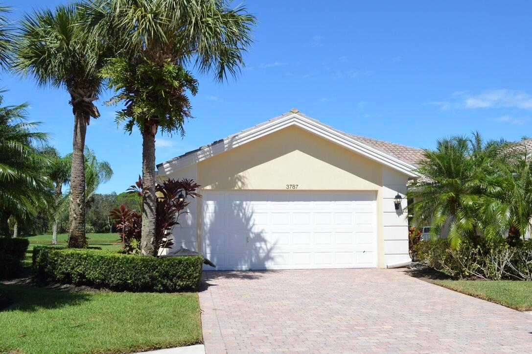 Live in the heart of paradise in the Retreat of Hobe Sound. This spacious 2/2 has a split floor plan, vaulted ceilings, 2 car garage, interior laundry and an oversized screened in lanai with breathtaking lake views. Enjoy all the amenities the Retreat has including a resort style heated pool and spa, tennis courts, fitness center, pickle and bocce ball courts. The Fazio designed Lost Lake Golf Club is next door and is open to the public with memberships options. This is an annual furnished or unfurnished lease.
