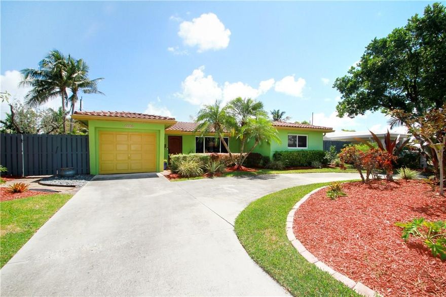 Coral Heights tropical paradise! No detail has been left out of this beautifully updated pool home: Barrel tile roof, impact windows and doors, both baths are recently updated, spacious custom kitchen with stainless appliances and granite countertops. A portion of the one car garage is enclosed under air making it a perfect office, with plenty of storage space remaining. Stunning back yard and pool area landscape  feels like you are in your own private oasis! Nothing left to do but move in and enjoy!