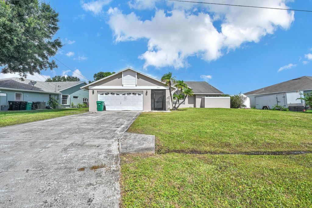 Photo of 2151 SE Bowie Street, Port Saint Lucie, FL 34952 (MLS # R11130480)