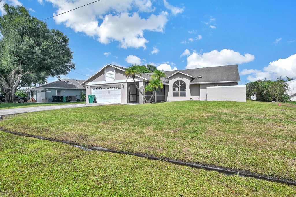 Photo of 2151 SE Bowie Street, Port Saint Lucie, FL 34952 (MLS # R11130480)
