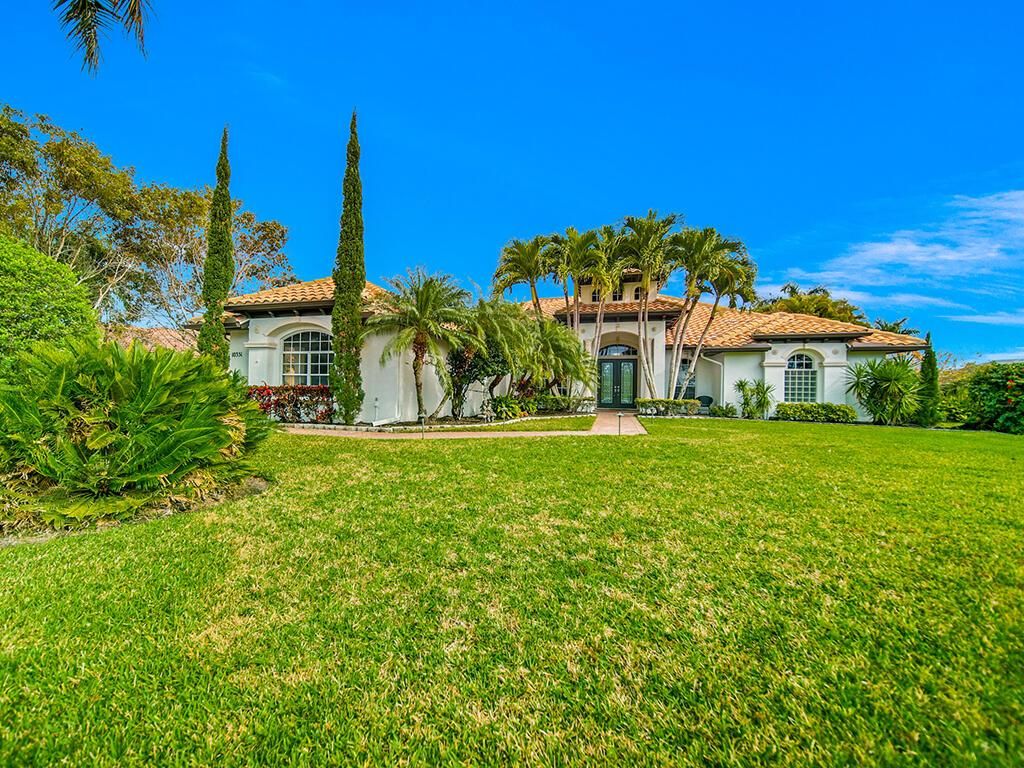 Photo of 10351 SW Whooping Crane Way, Palm City, FL 34990 (MLS # R10935005)