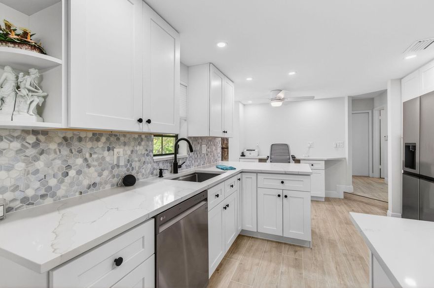 La Mirada at Boca Pointe • Lake views • 2023 full renovation • Corner townhome • Gated community • Pool nearby • Roof, exterior, cable, internet included • Optional Boca Pointe club membership.

Set within the gated La Mirada enclave of Boca Pointe, this corner townhome blends a 2023 interior renovation with tranquil lake views and a prime Boca Raton setting. Furnishings are negotiable, offering a potential turnkey opportunity. The 1,823 sq ft design features smooth ceilings, fresh paint, new tile flooring on the main level, and new laminate on the stairs and upper floor. The fully updated kitchen offers new cabinetry, countertops, and updated appliances, including an in-unit washer and dryer. The adjacent nook has been finished as a custom office space that can easily convert back to an eat-in area. The enclosed patio enhances everyday living with full sliders, new tile, and a storage closet overlooking the lake. Upstairs, all bedrooms were refreshed with painted closet doors and renovated baths featuring new vanities, tile, fixtures, and toilets. Additional improvements include a 2023 water heater and an AC from 2021. A two-car garage with built-in shelving and two additional parking spaces adds welcome convenience.

La Mirada offers a community pool just steps away, and the HOA includes roof and exterior maintenance, landscaping, cable, internet, reserves, common areas, and 24-hour security. Optional memberships to Boca Pointe Country Club provide access to golf, tennis, fitness, and dining. Ideally positioned near grocery, retail, dining, and essential services, the location also offers smooth travel connections with both Fort Lauderdale (FLL) and Palm Beach International (PBI) airports within an easy drive.