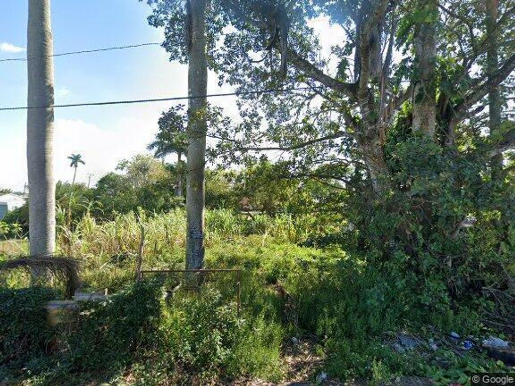 Photo of 215 SE 1st Avenue, South Bay, FL 33493 (MLS # R10920961)