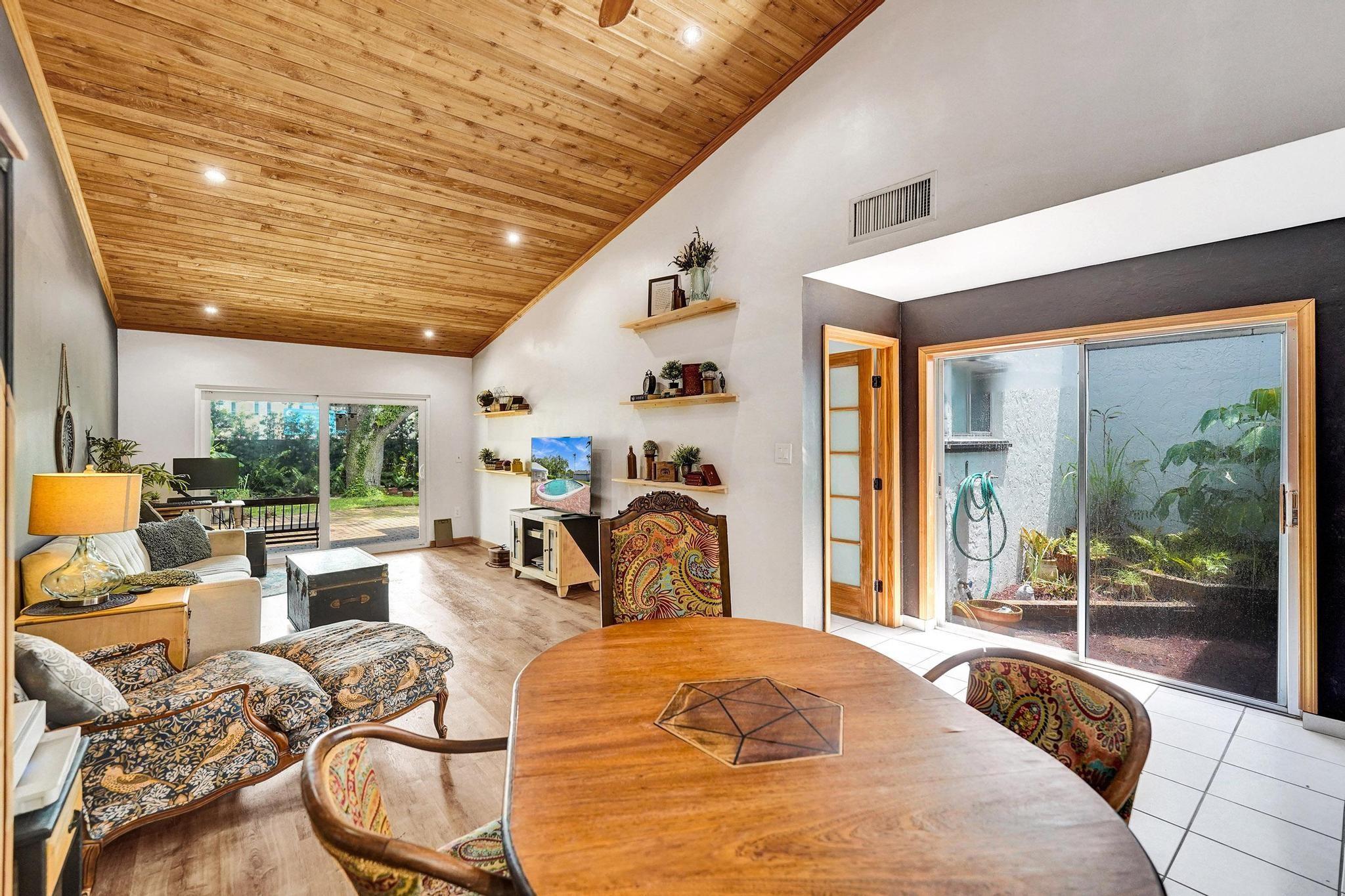 Beautiful Hollywood Hills villa just steps from excellent shopping, dining, and houses of worship.
Easy access to I-95 and the Turnpike, minutes from Hollywood Beach and the iconic Hard Rock Resort and Casino, Memorial Health and more.
This bright, open home features vaulted wood-trimmed ceilings, hurricane-impact windows and doors, newer AC, tankless water heater, new roof (2020), new vinyl flooring in the living room and bedrooms, cozy den complete with artistic built-ins, can easily be converted into a third bedroom. Step out into your Private fenced-in patio, a lush secluded retreat perfect for morning coffee or entertaining guests.
Amenities include a swimming pool and tennis court. Plus, this home is rental-ready with no HOA approval required.
South Florida living at its finest!
