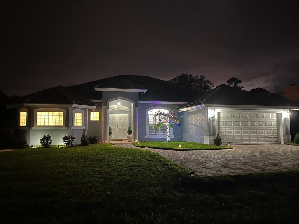 Photo of 1768 SW Import Drive, Port St Lucie, FL 34953 (MLS # R10852306)