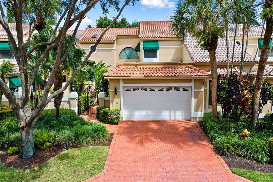 Spacious and bright golf course townhouse in Boca Pointe. Lushly landscaped front courtyard area. Dramatic double door entry into soaring ceilings and windows providing plenty of natural light. A ground floor master suite with double sink vanity, 2 walk-in closets, tub, shower and sliding doors leading to the patio. Large eat in kitchen with garden window. Spacious and screened patio area with sweeping golf course views. 2 Car Garage. New Roof.  Boca Pointe is a gated and secure community centrally located with optional club memberships available.