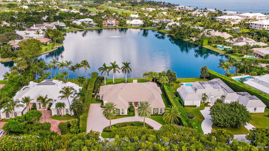 Located on tranquil Pelican Lake, this home totals over 5,600 square feet and consists of four bedrooms and four and a half bathrooms. The generously sized loggia and dining room lead out to the pool area, while the kitchen overlooks the covered patio, perfect for entertaining.