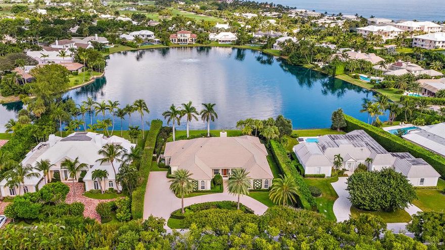 Located on tranquil Pelican Lake, this home totals over 5,600 square feet and consists of four bedrooms and four and a half bathrooms. The generously sized loggia and dining room lead out to the pool area, while the kitchen overlooks the covered patio, perfect for entertaining.