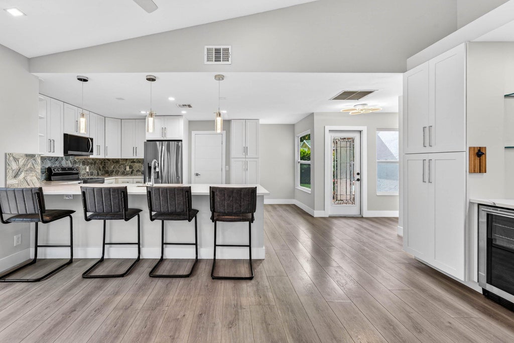 Photo of 13150 Bonnette Drive, Palm Beach Gardens, FL 33418 (MLS # R11155267)