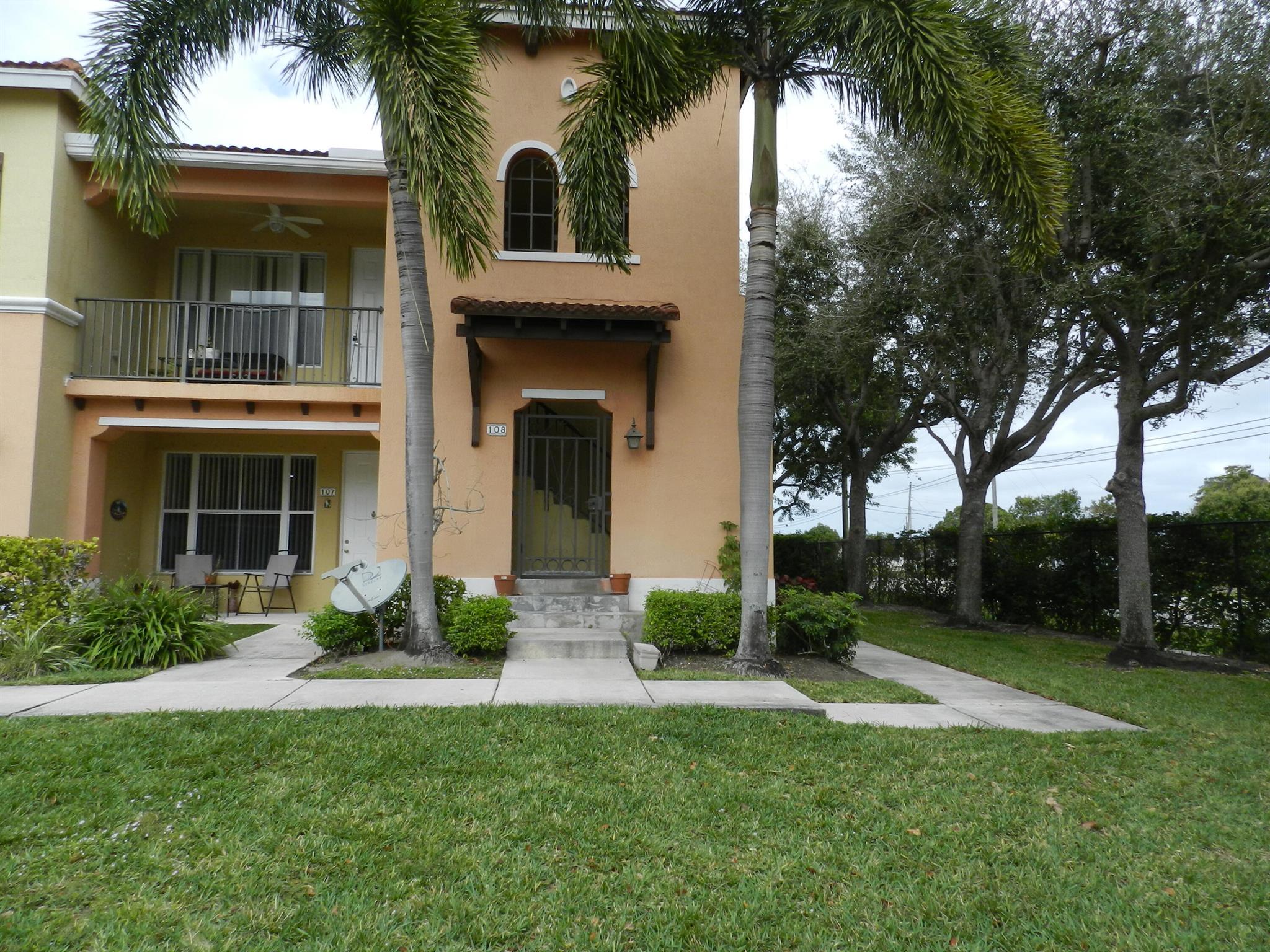 Immaculate, updated and beautiful 3/2 end unit with open concept. Located on the 2nd floor in a gated community close to I 95, shopping and dining. Washer and dryer in the unit. Community offers pool, exercise room and playground. Minutes to PBI airport.