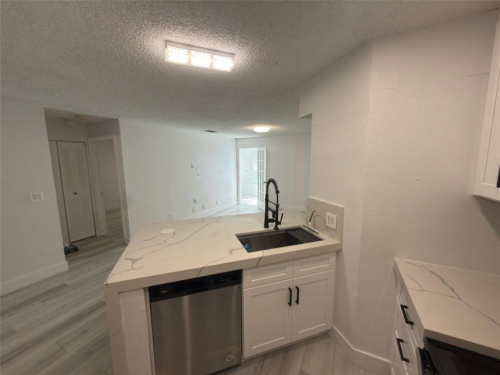 Photo of 3470 Pinewalk Drive #214, Margate, FL 33063 (MLS # F10549666)