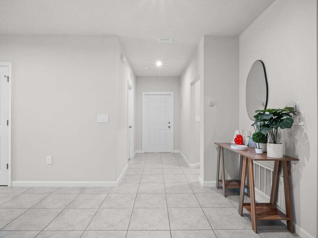 Photo of 819 Persimmon Place, Fort Pierce, FL 34981 (MLS # R11033927)