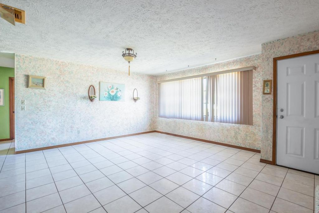 Photo of 372 SW Carter Avenue, Port Saint Lucie, FL 34983 (MLS # R11153436)