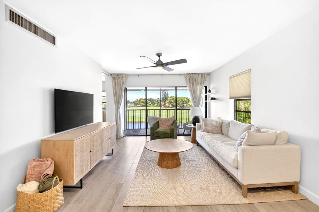 Photo of 551 Greensward Lane #204-d, Delray Beach, FL 33445 (MLS # B26033138)