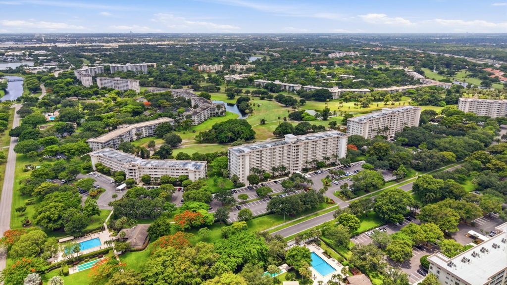 Photo of 3510 Oaks Way #703, Pompano Beach, FL 33069 (MLS # B26048860)