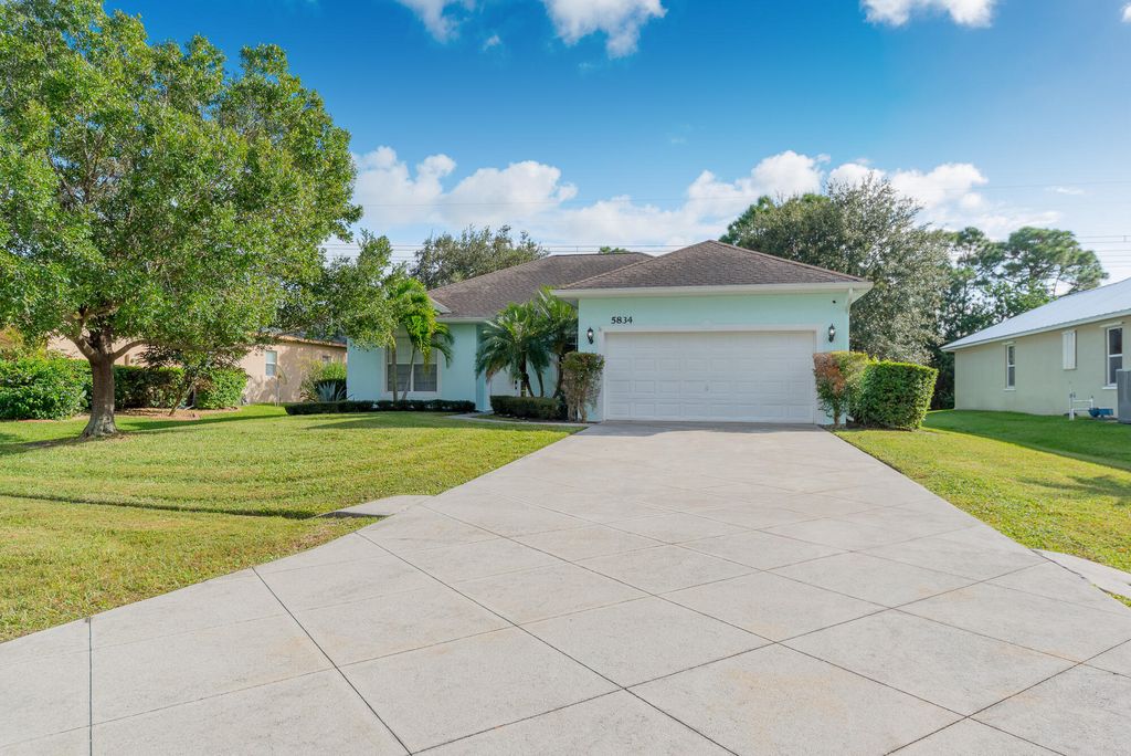 Photo of 5834 NW Windy Pines Lane, Port Saint Lucie, FL 34986 (MLS # R10938635)
