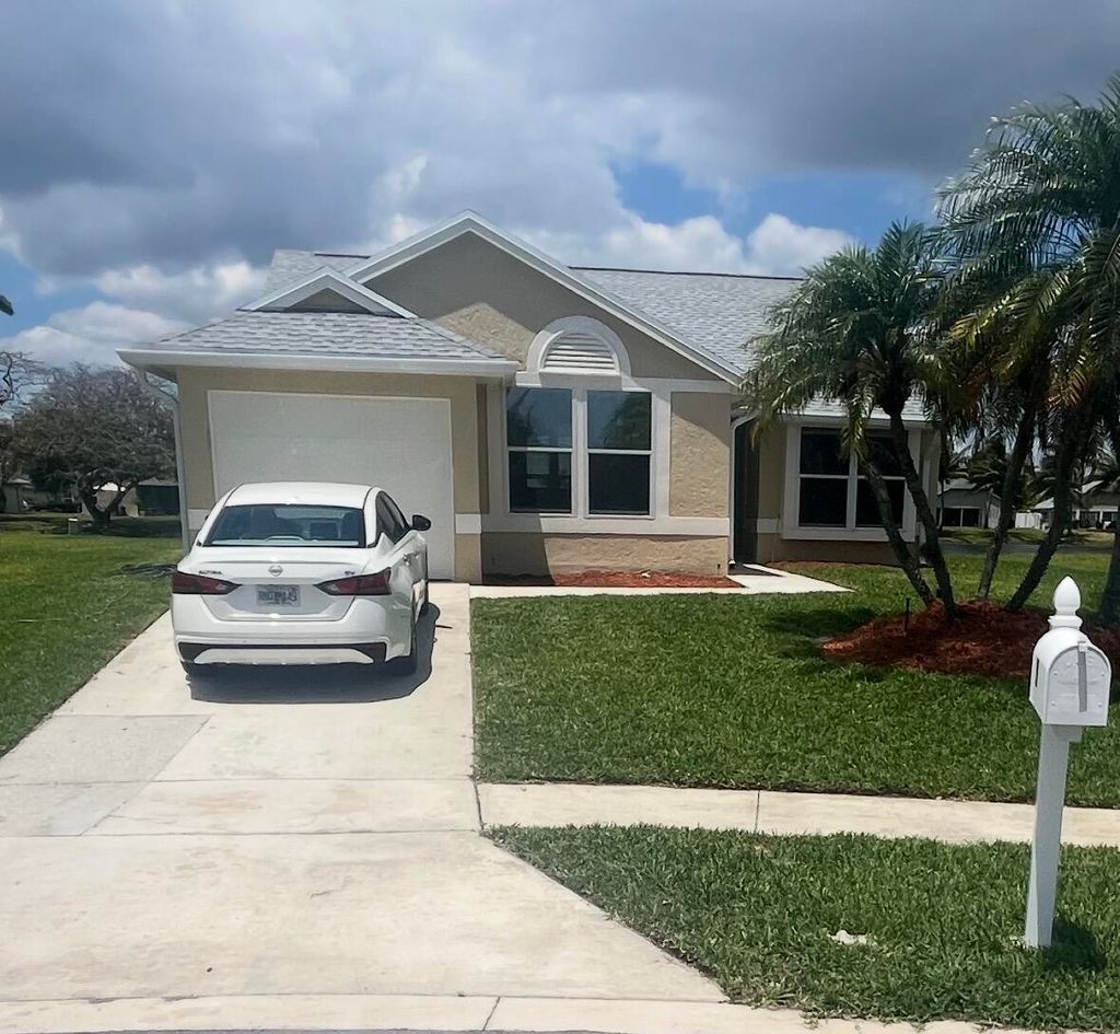 Photo of 31 Misty Meadow Drive, Boynton Beach, FL 33436 (MLS # B26024563)