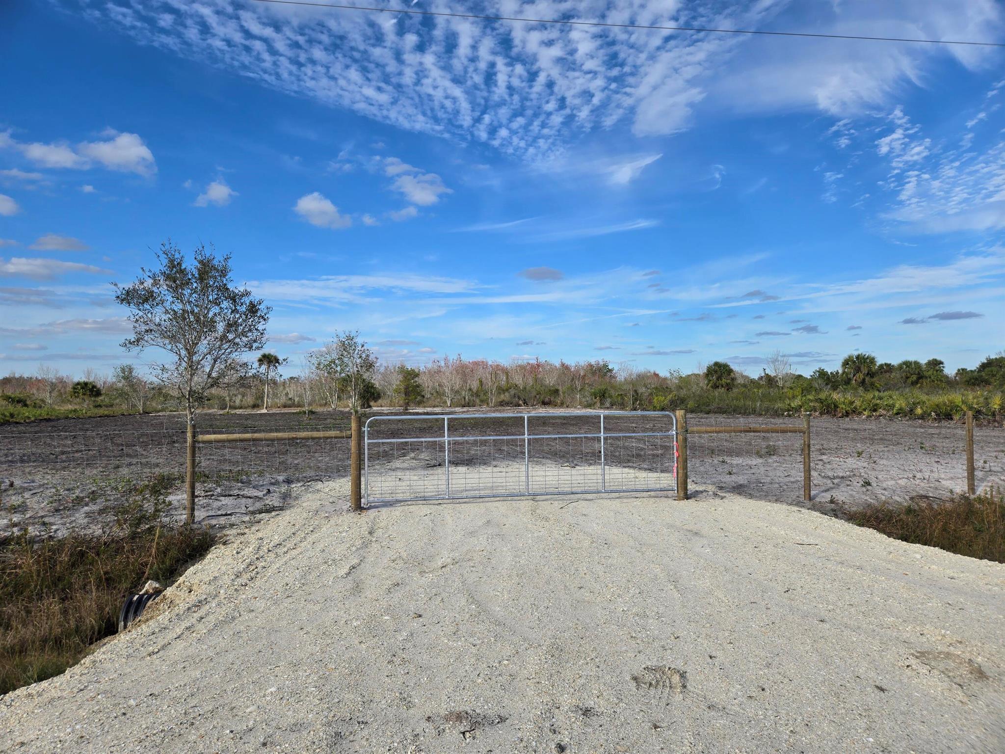2.5 Acres located in the Viking prairie. This lot has been cleared and has a culvert and gate. This property is (2) 1.25 acre lots back to back. Close to nw 192nd and easy access to power. Seller has done most of the improvements including the survey. Property is ready to build.