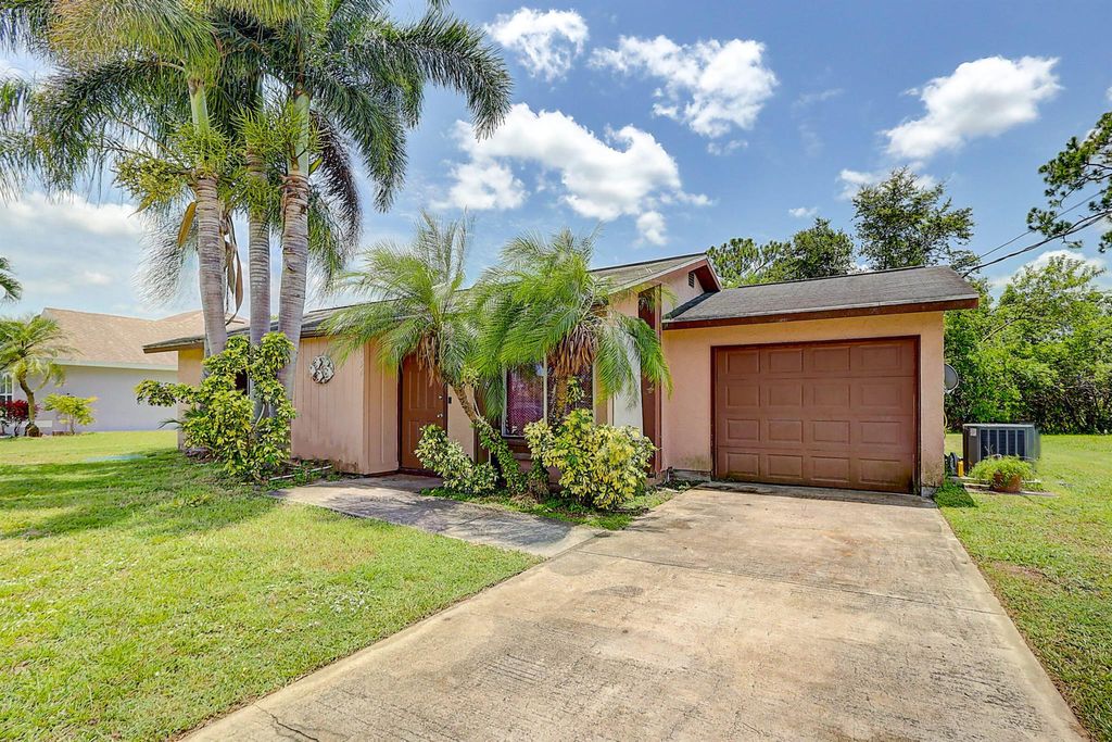 Photo of 154 SW Essex Drive, Port St Lucie, FL 34984 (MLS # R10898871)