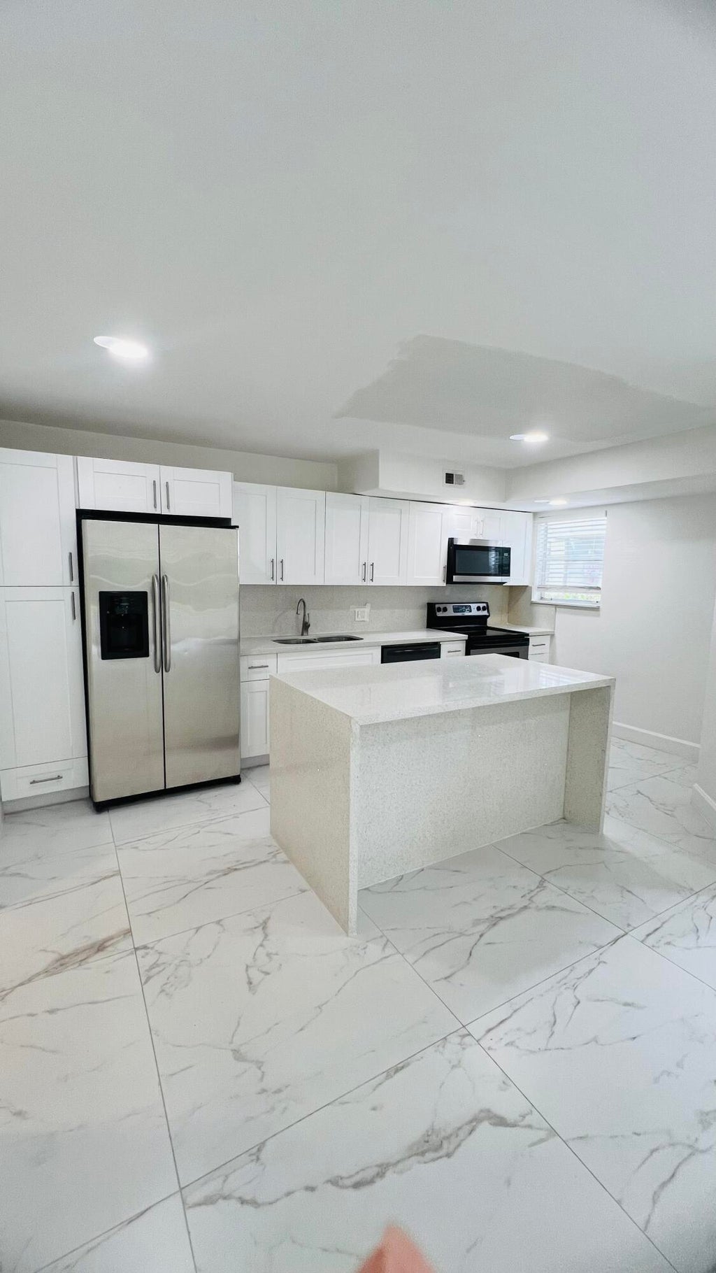 Photo of 1401 Village Boulevard #2012, West Palm Beach, FL 33409 (MLS # B26011049)