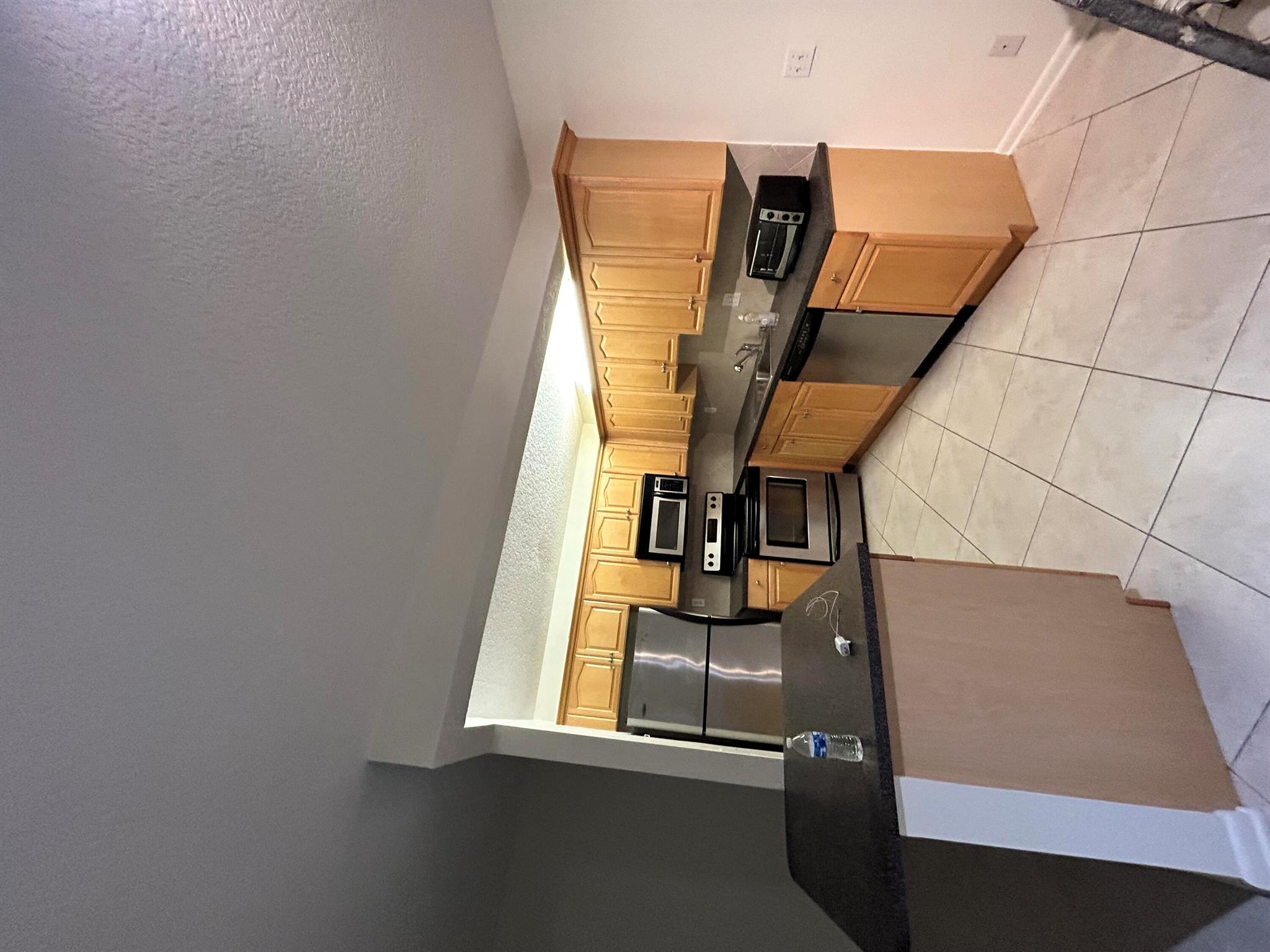 First floor corner unit in desirable Kings Point including but not limited to golf, tennis, shows and shuttle buses throughout community and local area. Laundry located in screened porch. Assigned parking close to door. First months rent plus $1000 security gets you in the door!