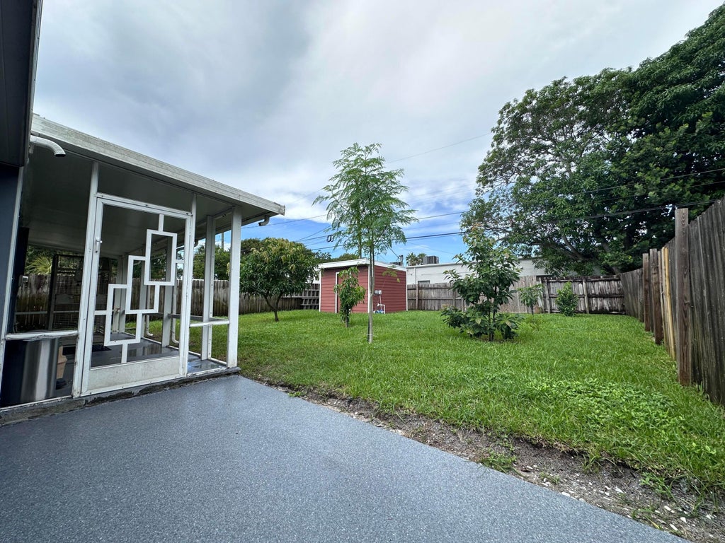 Photo of 1013 N C Street, Lake Worth Beach, FL 33460 (MLS # B26078348)