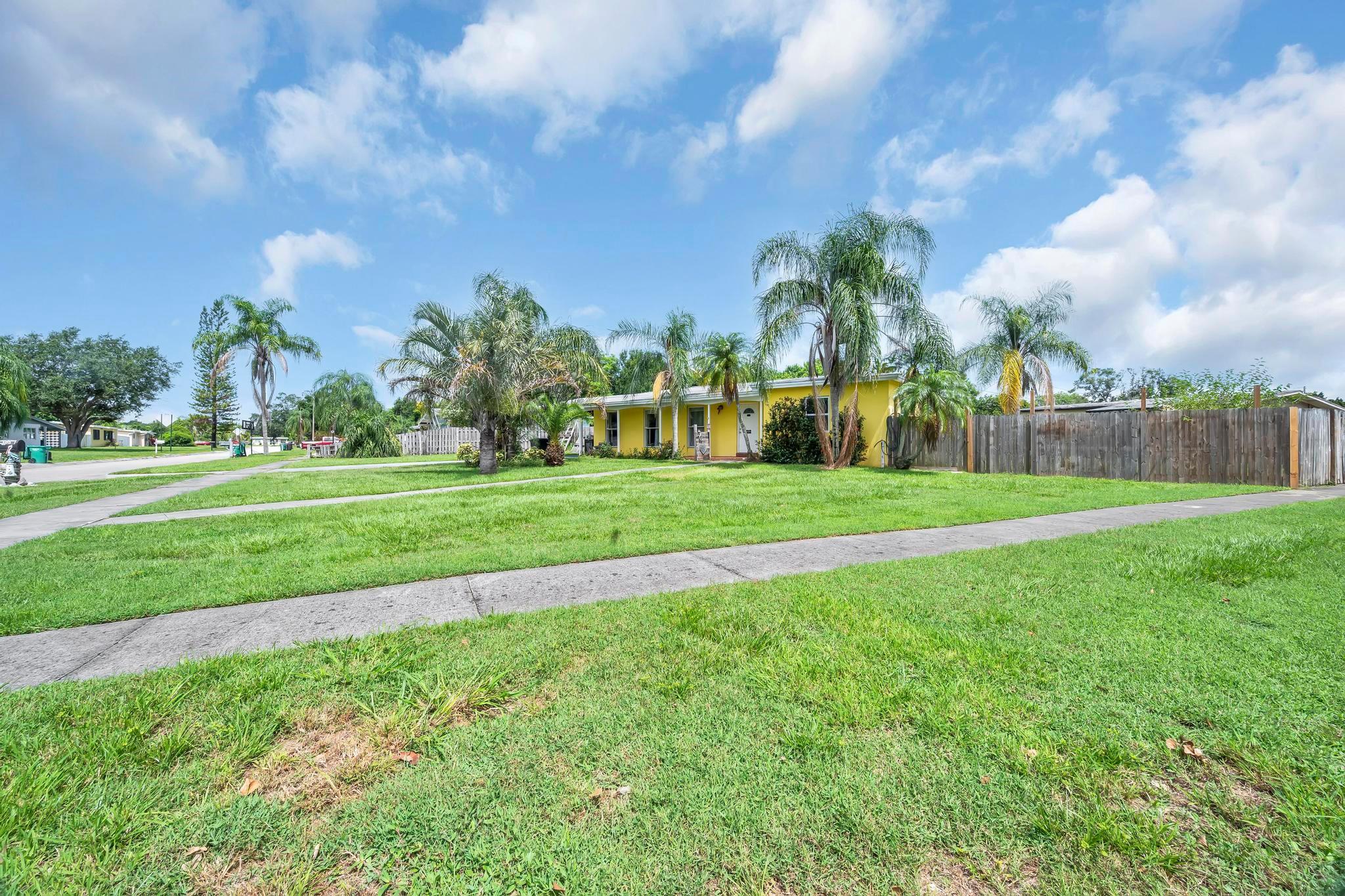 Charming 2-bed, 1-bath CBS pool home on an oversized corner lot! This move-in-ready gem boasts a remodeled kitchen with modern finishes, a beautifully updated bathroom, newer flooring, and stylish shiplap walls. Enjoy outdoor living with your private pool, perfect for relaxing and entertaining. The spacious oversized lot offers endless possibilities for landscaping and all your toys! Don't miss this perfect blend of modern upgrades and classic Florida charm!