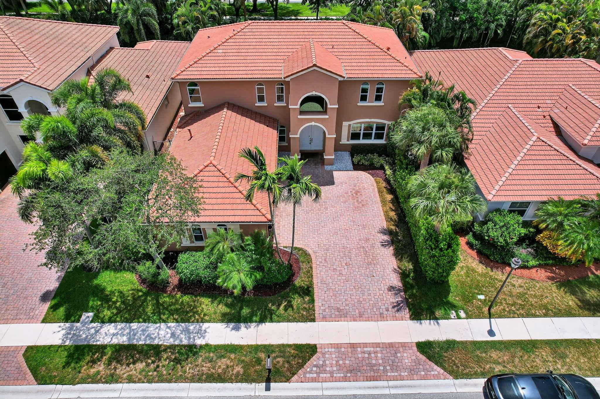 Welcome to Paradise! You CAN Have It ALL! Your very desirable spacious & rare Segovia Model offers 5 Bedrooms w/ plenty of room to spread out. No worries w/Your complete Hurricane Protection, Whole House Generator, & state-of-the-art remote-controlled Smart Technology. This elegant home features everything you want for your comfort & entertaining. Your Private Backyard Retreat is complete w/Tropical Heated pool, Summer Kitchen & manicured landscaping for Relaxing by the pool day & night. Mirabella at Mirasol is an Exclusive, Premier Gated Community w/Top-Tier Amenities & Resort Style Living in the Heart of PBG w/World Class Shopping & Restaurants. Live the Lifestyle you Dreamed of & Immerse Yourself in everything that Mirasol has to offer! 247 Sedona Way is Your New Home in Paradise!