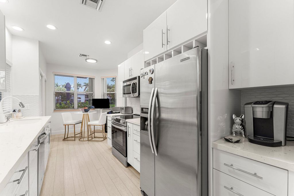 Photo of 2221 NW 62nd Drive, Boca Raton, FL 33496 (MLS # B26022588)