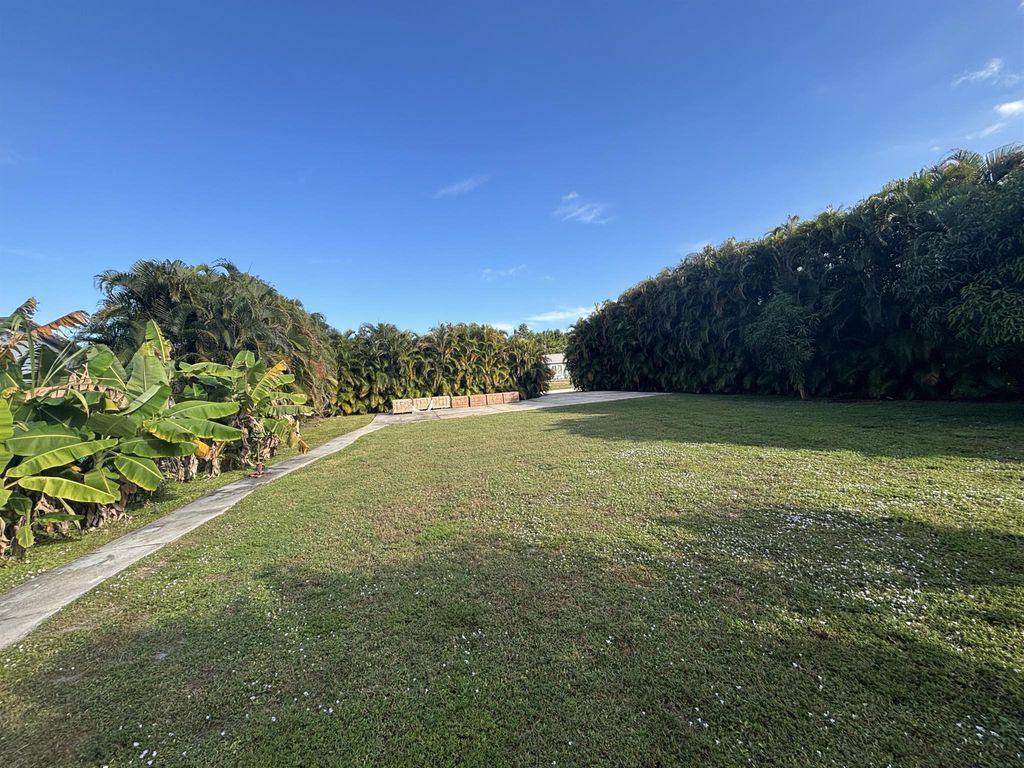 Photo of 1256 SE Ladner Street, Port Saint Lucie, FL 34952 (MLS # R11145213)