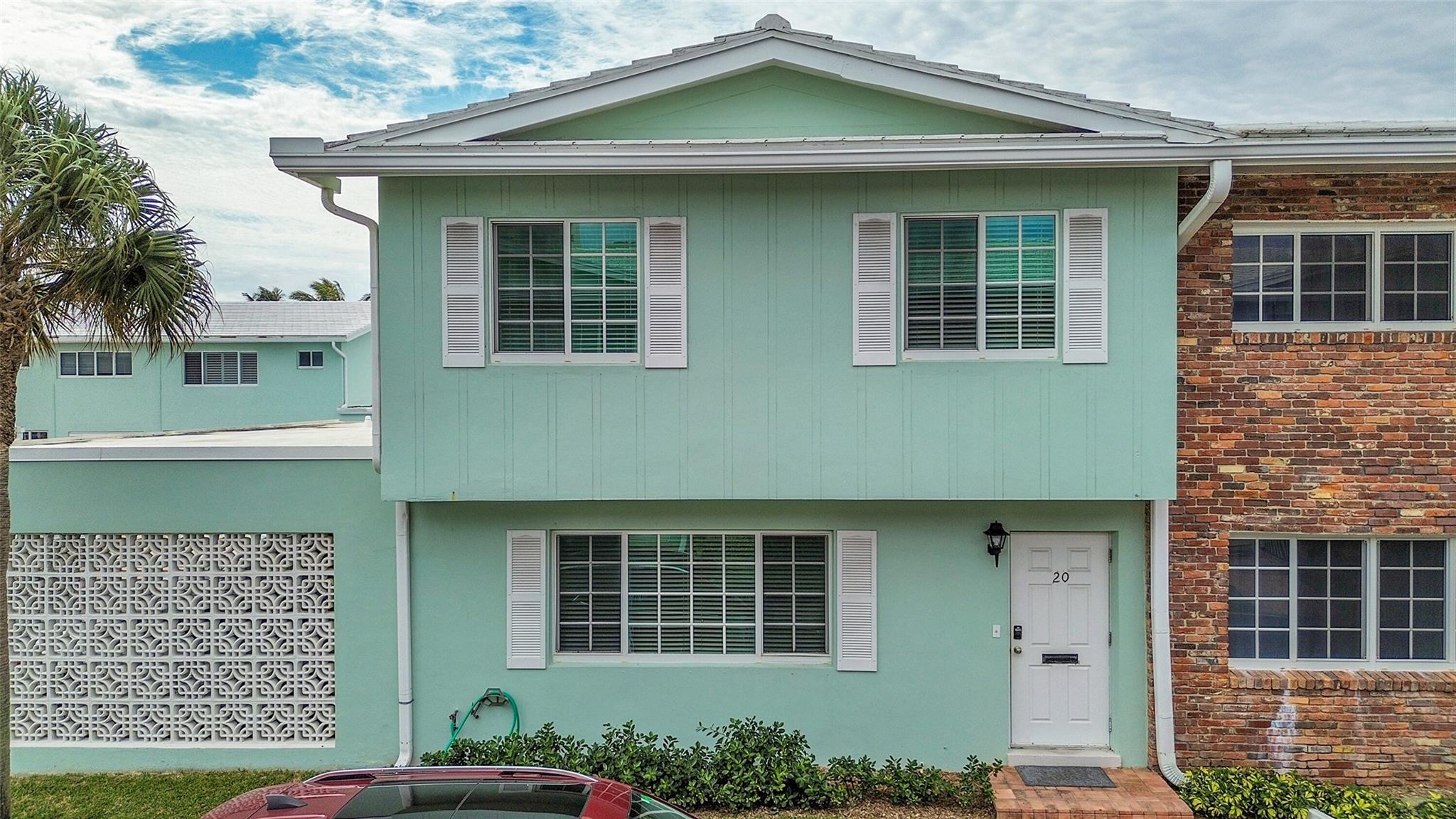 Beautiful corner unit townhome with direct beach access. This 3 bedroom, 2.5 bath has been substantially renovated to include a kitchen remodel and full bathroom remodels. Primary bedroom has a large walk-in closet and a spacious seating area with an additional closet. Full size newer stackable washer/dryer in laundry, newer hot water heater and a/c. This townhome has unique qualities such as a private back door entrance that has direct access to the assigned covered parking space and additional outside storage within steps reach and ease of access and a direct access gate to the pool which can be locked. Newer A/C and water heater. Great condition! Just add your own personal touches and feel like you're living in your very own beach house everyday!