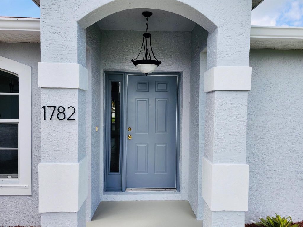 Photo of 1782 SW Brisbane Street, Port Saint Lucie, FL 34984 (MLS # R11118166)