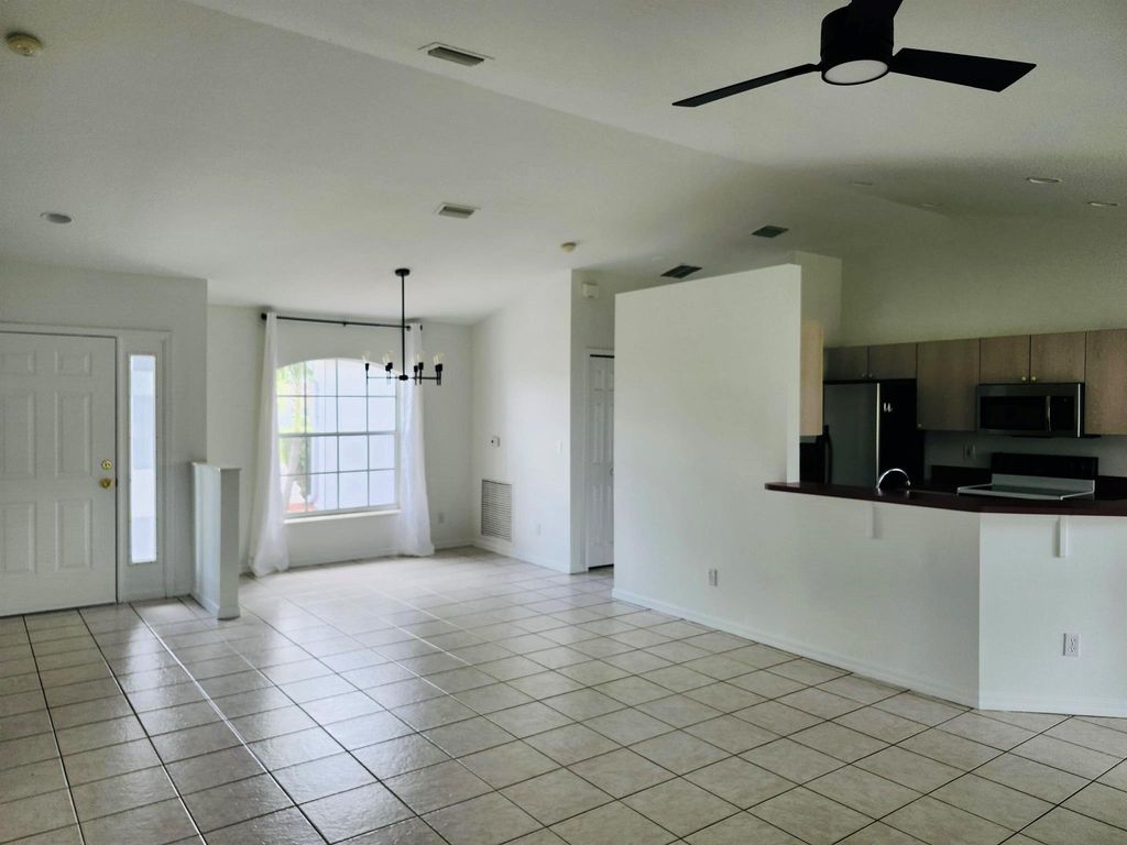 Photo of 1782 SW Brisbane Street, Port Saint Lucie, FL 34984 (MLS # R11118166)