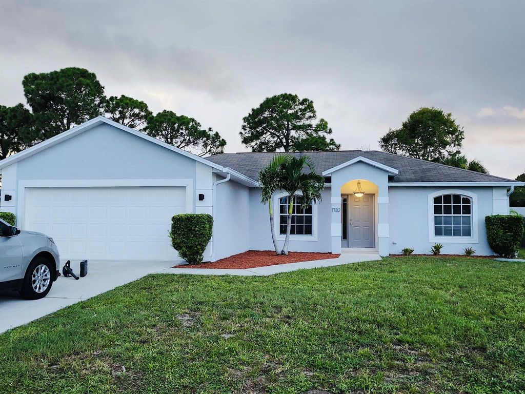 Photo of 1782 SW Brisbane Street, Port Saint Lucie, FL 34984 (MLS # R11118166)