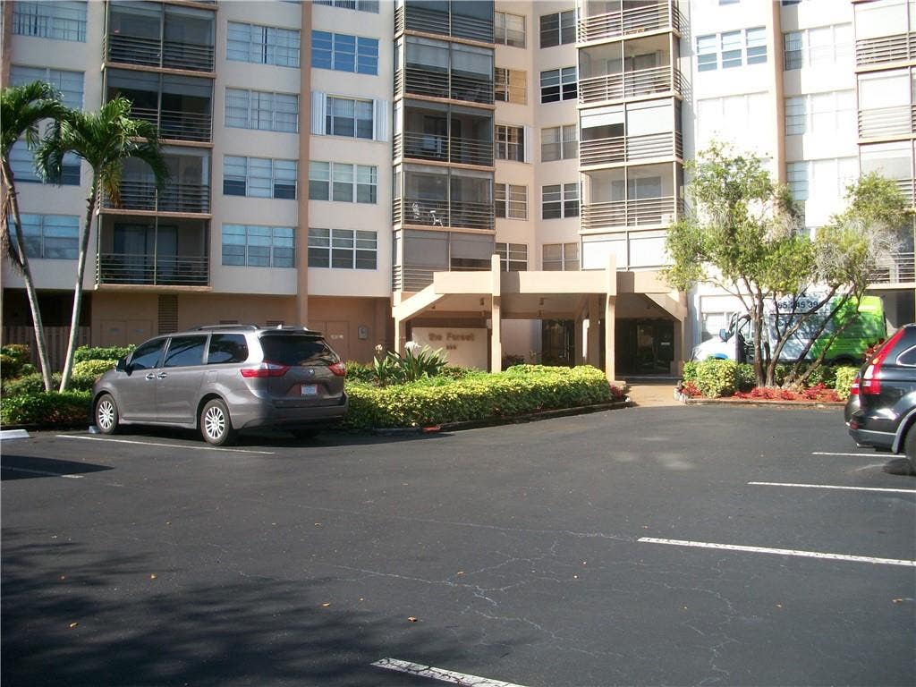 Photo of 900 SAINT CHARLES Place #311, Pembroke Pines, FL 33026 (MLS # B26064917)