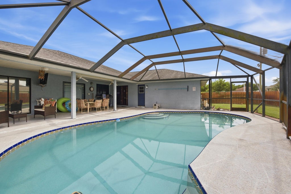 Photo of 1980 SW AGUERO Street, Port Saint Lucie, FL 34953 (MLS # B26077908)