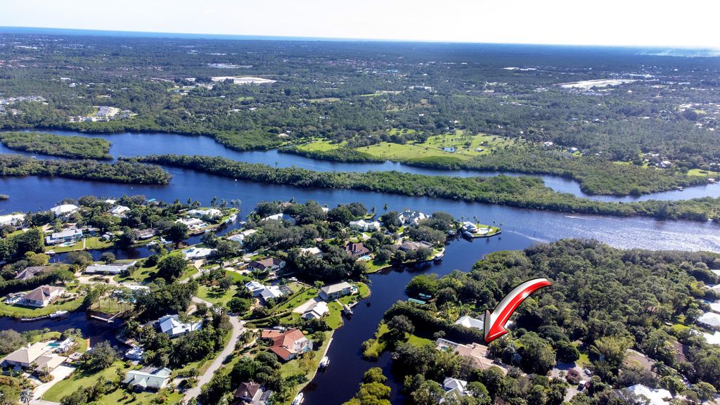 Photo of 5515 SW Whippoorwill Avenue, Palm City, FL 34990 (MLS # R10849659)