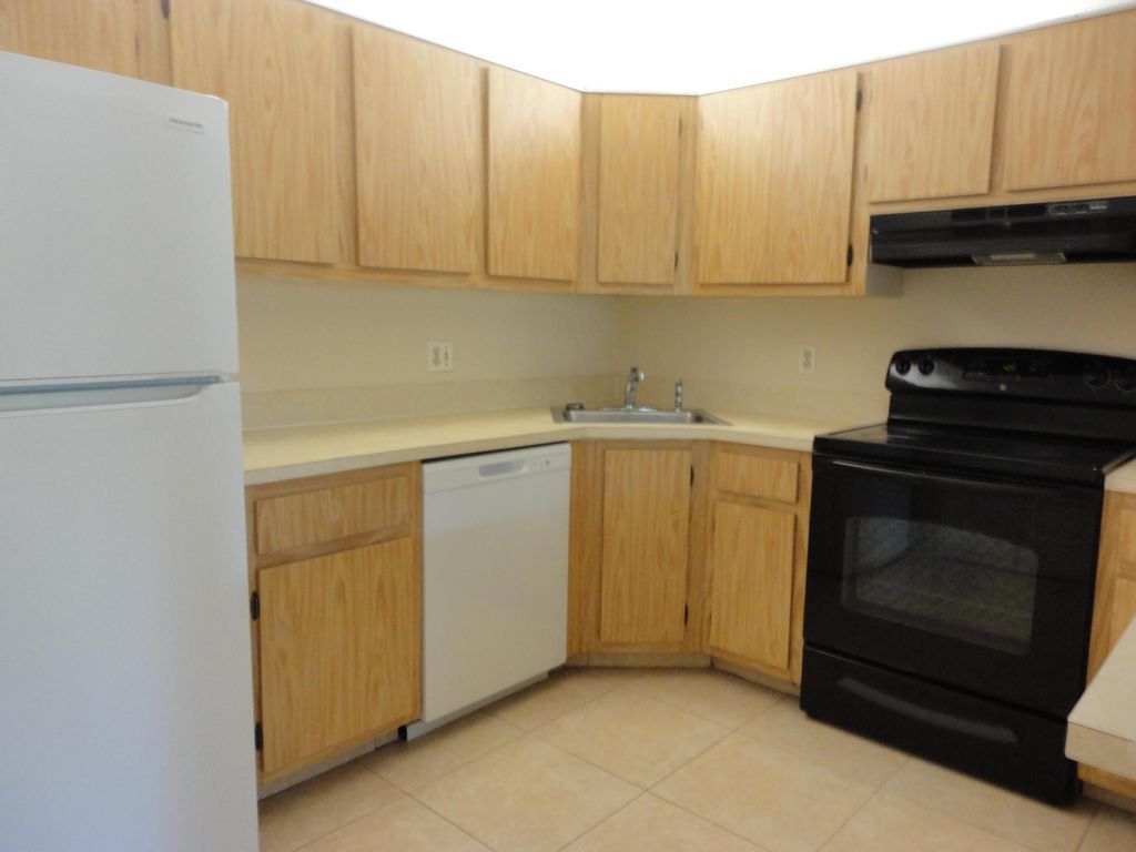 Photo of 425 Pine Glen Lane #C-2, Greenacres, FL 33463 (MLS # B26009626)