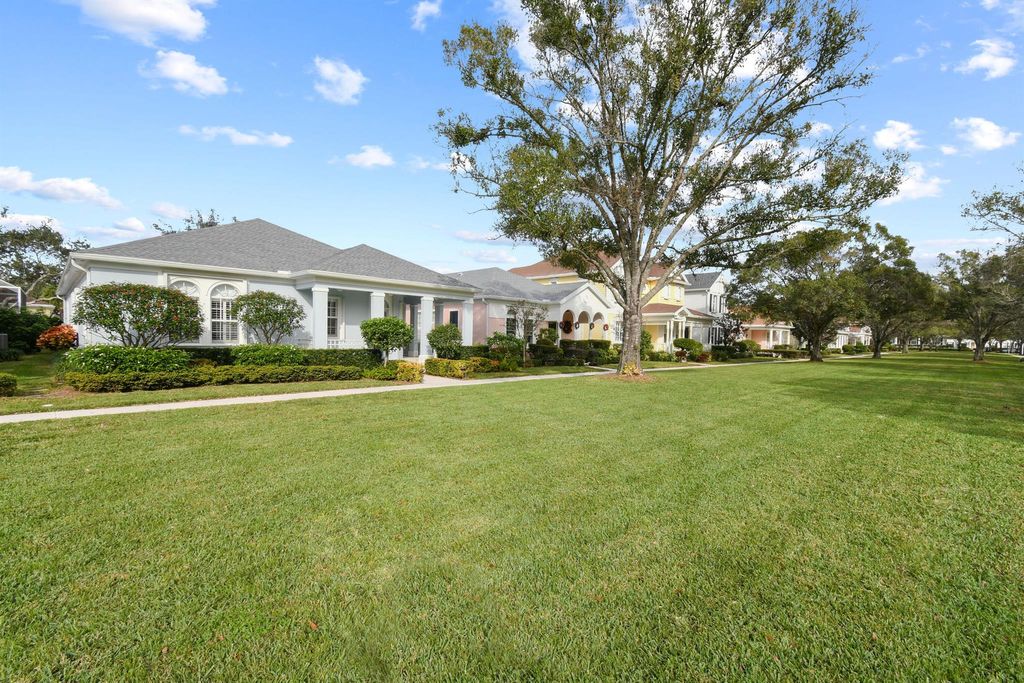 Photo of 117 Poinciana Drive, Jupiter, FL 33458 (MLS # R10947205)