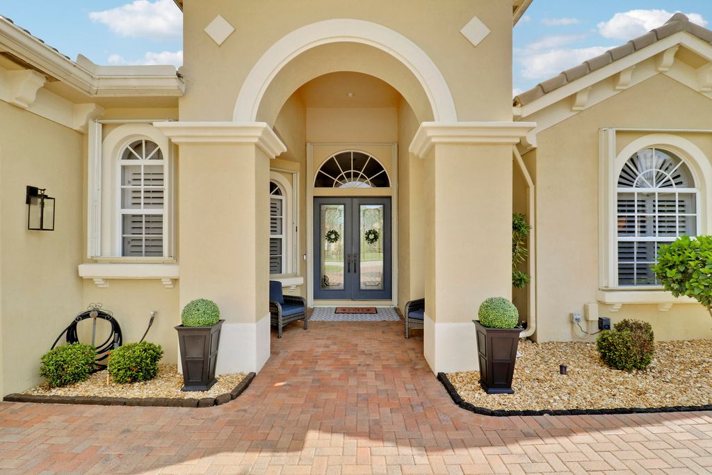 Photo of 8726 Tompson Point Road, Port Saint Lucie, FL 34986 (MLS # B26008424)