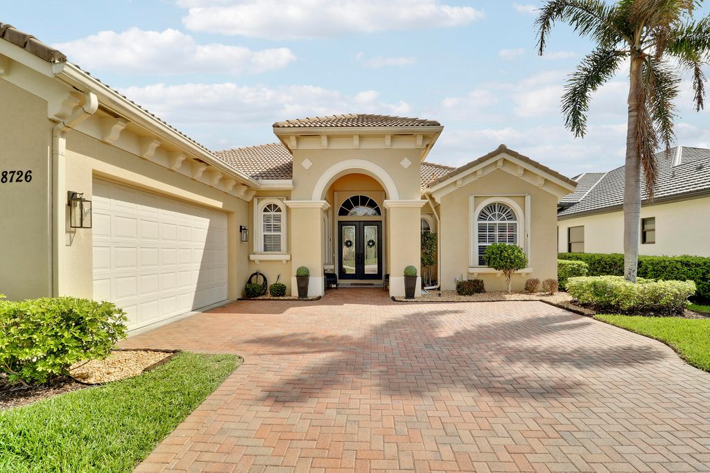 Photo of 8726 Tompson Point Road, Port Saint Lucie, FL 34986 (MLS # B26008424)