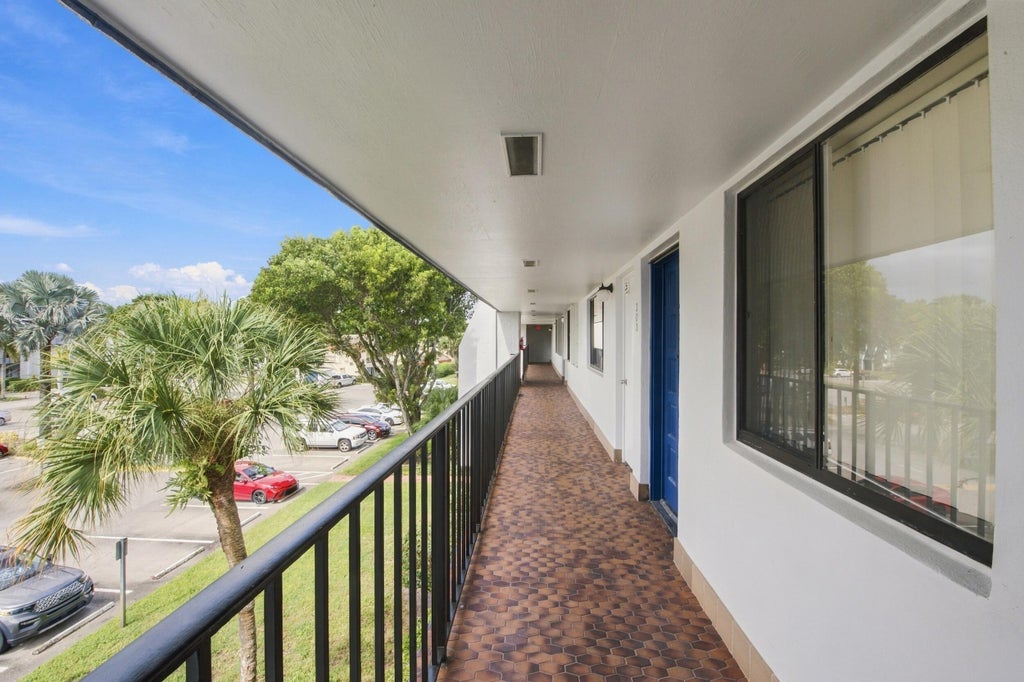 Photo of 4545 LUXEMBURG Court #303, Lake Worth, FL 33467 (MLS # B26091119)
