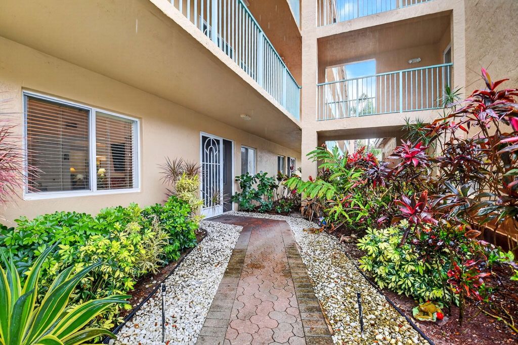 Photo of 12560 Majesty Circle #104, Boynton Beach, FL 33437 (MLS # B26004864)